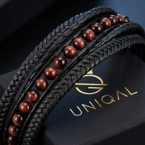 Schwarzes Herren Lederarmband mit Tigerauge Naturstein Perlen und geflochtenem Leder im eleganten Design