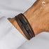 Braunes Lederarmband BROWN HEAVEN mit schwarzem Edelstahl-Kreuz und Magnetverschluss – Uniqal Herrenschmuck
