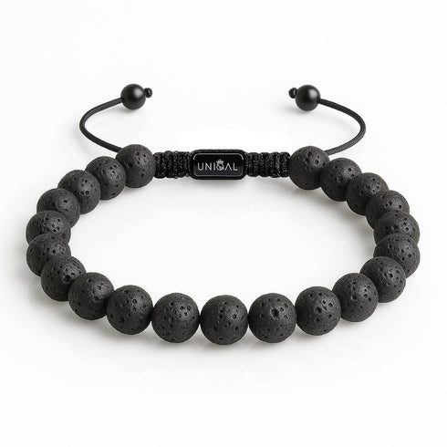 Uniqal schwarzes Lavasteinarmband freigestellt vor hellem Hintergrund, minimalistischer Schmuck