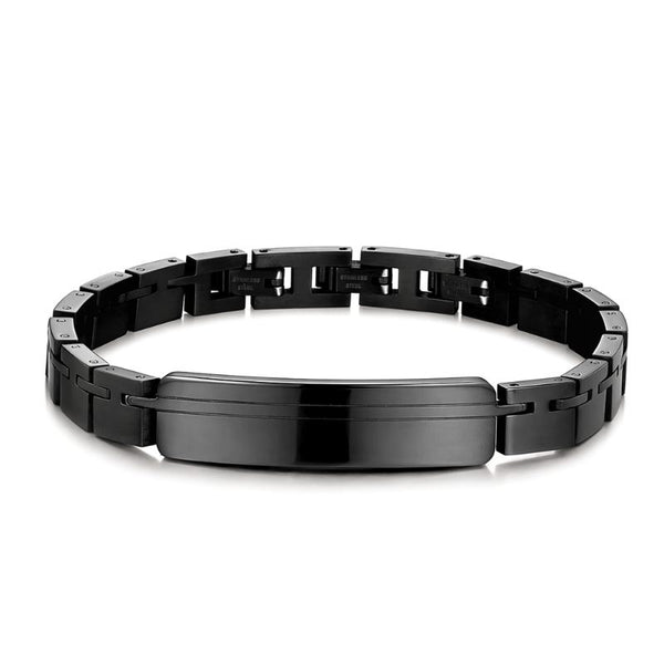 VELARO BLACK schwarzes Edelstahlarmband mit Gravurplatte auf weißem Hintergrund, personalisierbar und erweiterbar mit Extension-Elementen für perfekte Passform. Uniqal