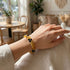 Uniqal Edelsteinarmband Onyx Honigachat – ausgleichende Präsenz