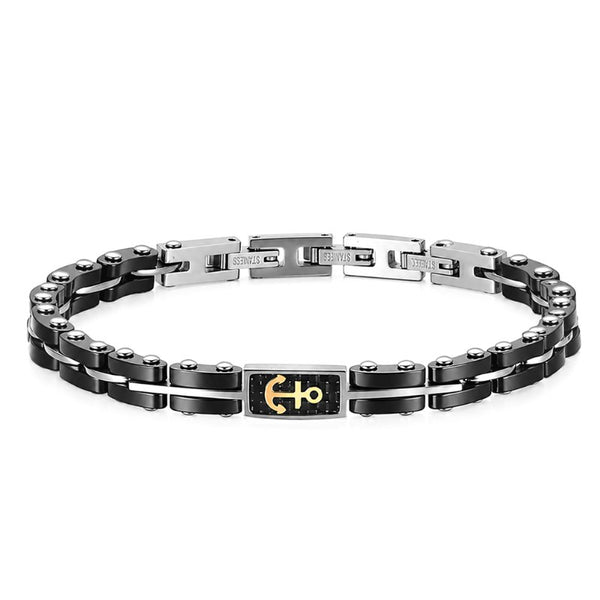ANCORA uniqal Anker Armband aus schwarzem Edelstahl mit goldfarbenem Ankersymbol und maritimem Luxusdesign in Frontalansicht