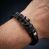 BLACK ADVENTURE Armband in schwarzer Geschenkbox mit goldenem UNIQAL Logo