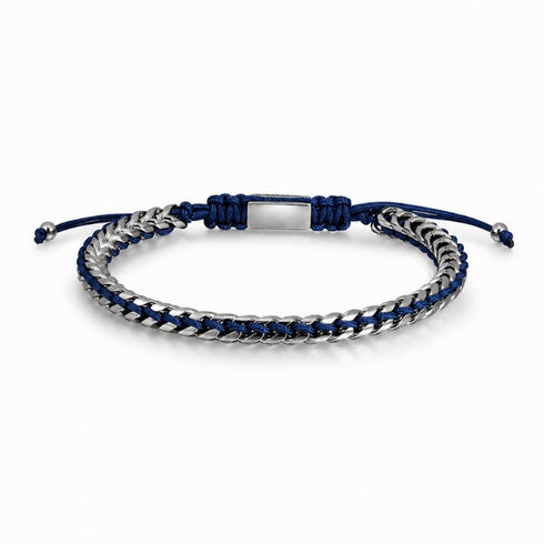 IBIZA Armband von UNIQAL mit dunkelblauem Tau, verflochtenen silberfarbenen Kettengliedern und verstellbarem Schiebeknoten auf weißem Hintergrund.