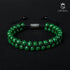 Elegantes Malachit Armband – grün-schwarz mit luxuriösem Kontrast auf schwarzem Hintergrund