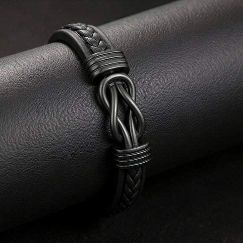 Handgefertigtes Luxusarmband für Herren – schwarzes Echtleder mit Infinity-Detail aus Edelstahl.