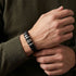 Uniqal BLACK MAMBA Armband für Männer – edles schwarz-silbernes Herrenaccessoire mit markanten Metallelementen und modernem Design.