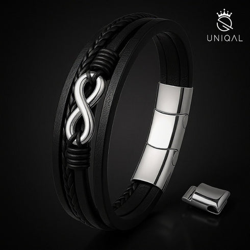 Handgefertigtes UNIQAL Infinity Armband aus schwarzem Rindsleder und glänzender Stahldetail – Ausdruck von Eleganz und Stärke.