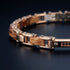 UNIQAL CALDO HOLZ ROSEGOLD mit dezentem Funkeln, hochwertiger Verarbeitung und natürlicher Wärme.