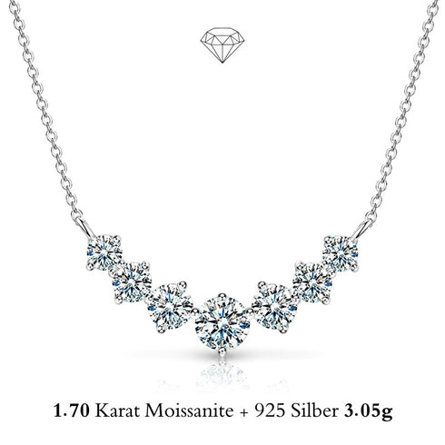 UNIQAL CLARA Moissanit Smile Collier aus 925 Sterling Silber mit sieben abgestuften Edelsteinen in strahlender Diamant-Optik.