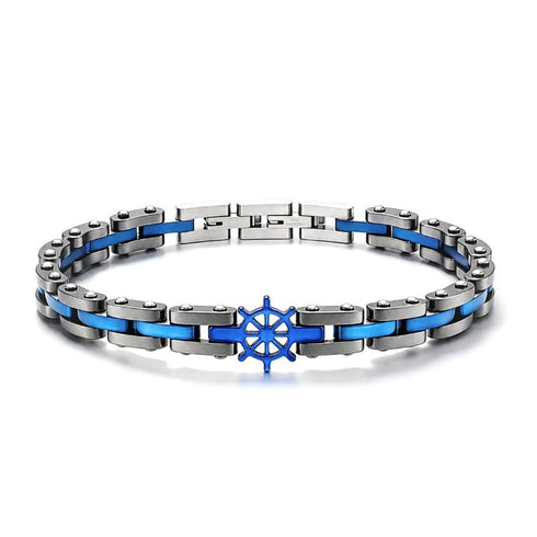 UNIQAL CORSO BLAU Edelstahl Armband mit Hämatit und blauem Steuerrad in Silber, Blau und Anthrazit auf weißem Hintergrund