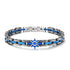 UNIQAL CORSO BLAU Edelstahl Armband mit Hämatit und blauem Steuerrad in Silber, Blau und Anthrazit auf weißem Hintergrund
