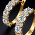 UNIQAL DIAMORA GOLD Detailaufnahme der präzise gefassten Steine mit intensiver Brillanz und hochwertiger Vergoldung