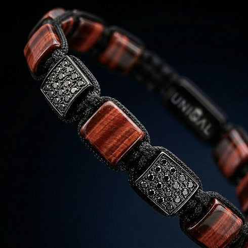 Hochwertiges Edelsteinarmband von UNIQAL mit poliertem rotem Tigerauge und funkelnden schwarzen Zirkonia