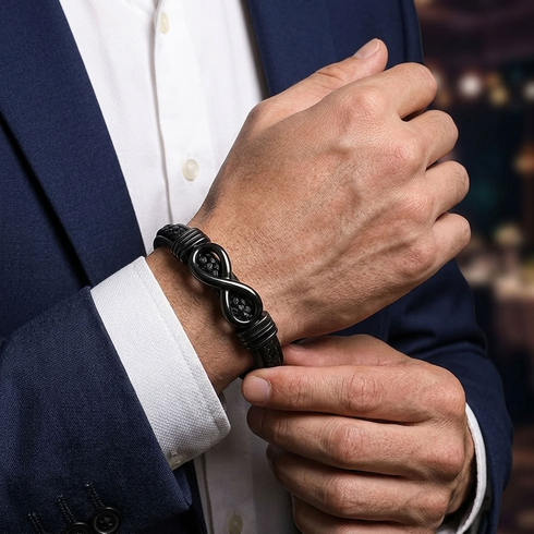 Uniqal ENDLESS BLACK Armband für Männer – elegantes schwarzes Flechtarmband mit Infinity-Element für einen modernen Business-Look.