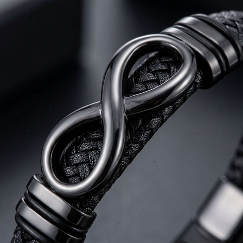 Uniqal ENDLESS BLACK Armband für Männer – modernes schwarzes Herrenaccessoire mit Infinity-Element und markanter Flechtstruktur.