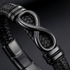Uniqal ENDLESS BLACK Herrenarmband – schwarzes Flechtarmband mit großem Unendlichkeitszeichen für Männer mit modernem und ausdrucksstarkem Stil.
