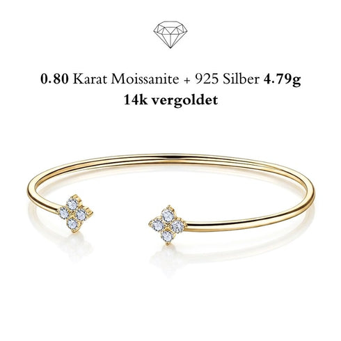 UNIQAL FELICIA luxuriöser Armreif mit 14K Vergoldung und strahlenden Blütenelementen für elegante Damen.