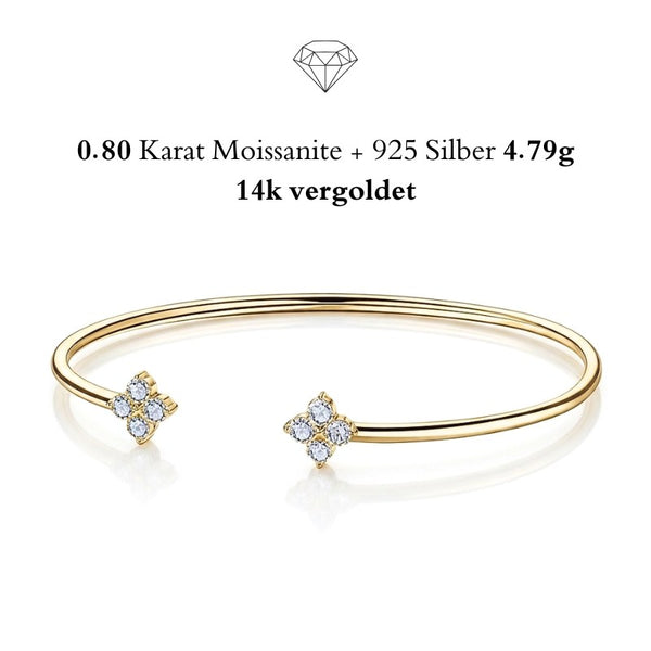 UNIQAL FELICIA luxuriöser Armreif mit 14K Vergoldung und strahlenden Blütenelementen für elegante Damen.