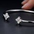 Elegantes offenes Cuff-Armband UNIQAL FELICIA mit modernem Designer-Look und luxuriöser Ausstrahlung.