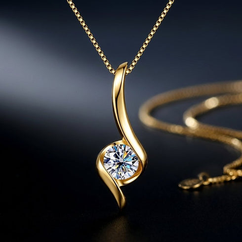 UNIQAL FLAMELLA Premium Collier mit fließendem Gold Design und intensivem Lichtreflex