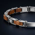 UNIQAL FORTE HOLZ SILBER verbindet warmes Holz, kühle Stahloptik und italienischen Stil zu einem besonderen Accessoire.