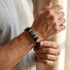 Uniqal GAMBLER Armband für Männer – luxuriöses braun-silbernes Herrenaccessoire mit dekorativen Ornamenten und hochwertiger Optik.