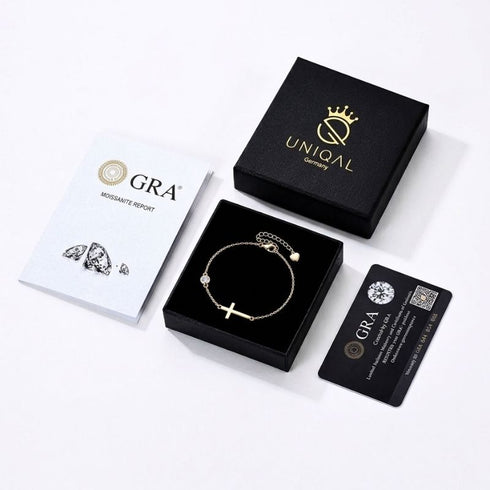 GRACE 14K GOLD Moissanit-Armband von UNIQAL als Geschenkset mit schwarzer Schmuckbox, passendem Deckel, GRA-Bericht und Zertifikatskarte.