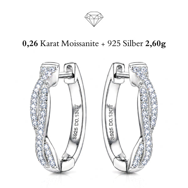 Luxuriöses Schmuckpaar aus rhodiniertem Edelmetall mit filigraner Pavé-Verarbeitung und harmonischer Form