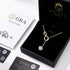 UNIQAL Luxus Schmuckbox mit vergoldetem Infinity Collier und zertifiziertem Moissanit Anhänger