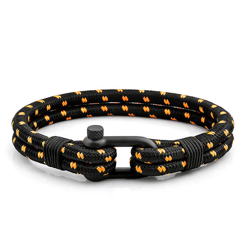 Uniqal KATARA maritimes Armband aus schwarzem Segeltau mit kontrastreicher Flechtung in klarer Produktansicht