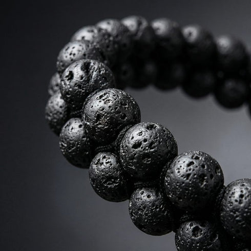 Zweireihiges Lava Edelsteinarmband von Uniqal – gleichmäßige 6 mm Perlen, tiefe Schwarztöne, reduziertes Naturdesign