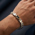 UNIQAL MARINO Unisex Armband am Handgelenk – hochwertiges 316L Edelstahl Armband mit Hämatit, goldenem Anker und silber-goldenem Design
