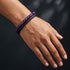 Uniqal PASSION AMETHYST Armband für Damen – elegante Kombination aus Amethyst-Perlen und schwarzem Flechtleder für Alltag und Freizeit