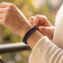 Uniqal PASSION LAPIS Armband – elegantes blau-schwarzes Accessoire mit Lapis-Perlen und geflochtenem Leder für einen modernen Alltagsstil