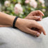 Uniqal PASSION LAVA Armband – stilvolles schwarzes Accessoire mit Lavastein-Perlen und geflochtenem Leder für einen modernen Lifestyle