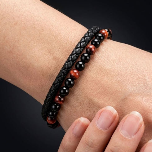 Uniqal PASSION RED TIGER EYE Armband am Handgelenk – schwarzes Flechtleder mit roten Tigerauge-Perlen und glänzenden schwarzen Kugeln
