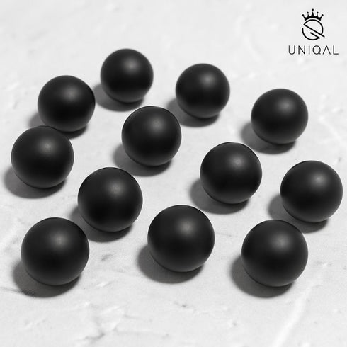 Uniqal Onyx Natursteinperlen 6 mm in Detailaufnahme – matte Oberfläche, gleichmäßige Kugelform, doppelte Reihen