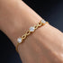 UNIQAL personalisierbares Damen Armband mit Infinity Symbol und luxuriösem Goldglanz
