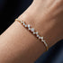 UNIQAL STELLARA Couture Armband mit strahlendem Moissanit Besatz und ikonischer Goldsilhouette