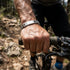 SILVER RIDER Edelstahlarmband getragen beim Mountainbike Abenteuer mit sportlichem Outdoor Charakter und glänzender Metalloptik