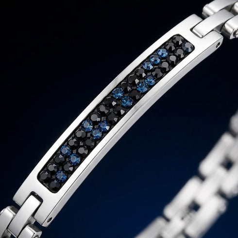 UNIQAL STELLE Designerarmband mit geschwungener Mittelplatte und brillant eingefassten Schmucksteinen in Galaxie-Optik
