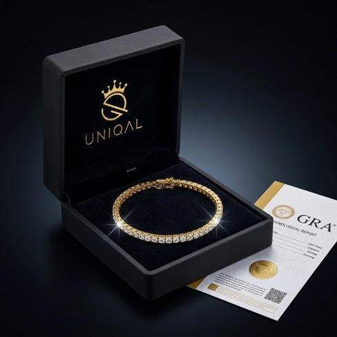 UNIQAL Tennisarmband Gold in stilvoller Geschenkbox mit Zertifikat als hochwertiges Präsent für besondere Momente.