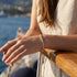UNIQAL Tennisarmband Gold perfekt für Layering, Arm Candy und moderne Schmuckkombinationen.