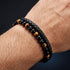 Uniqal TIGER EYE PASSION Herrenarmband mit personalisierter Gravur – individuelles Armband mit Tigerauge, schwarzen Perlen und geflochtenem Leder