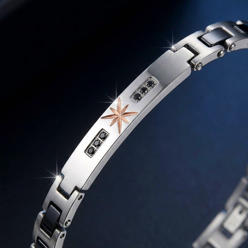 UNIQAL TITANO KERAMIK SILBER mit präzise gefassten Schmucksteinen, robuster Mittelplatte und klarer Luxuswirkung.