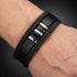 Uniqal VORTEX S Herrenarmband – modernes schwarz-silbernes Lederarmband mit geflochtenen Seiten und dekorativen Metallelementen