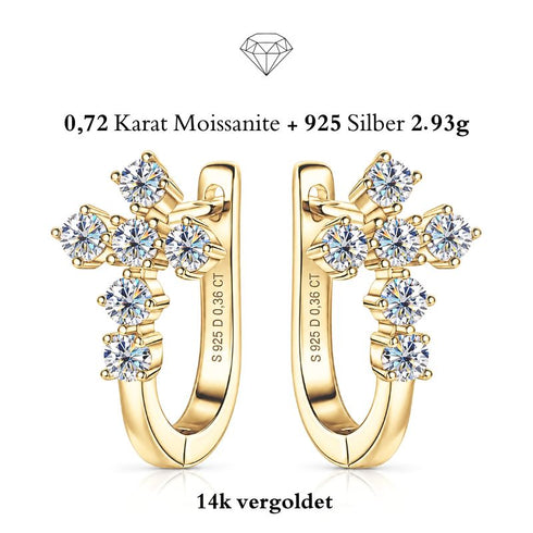 VERA 14K GOLD von UNIQAL: Kreuzohrringe aus 925 Silber mit 14K-Goldplattierung und insgesamt 0,72 Karat Moissanit, paarweise auf weißem Hintergrund.