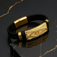 Goldenes Uniqal Lederarmband für Herren – Symbolkraft, Gravur und Stil in einem