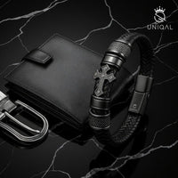 Schwarzes GLORY Armband von Uniqal auf Marmorboden – luxuriöses Accessoire mit Symbolkraft; ideale Geschenkidee zum Geburtstag oder Jubiläum.